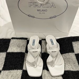 Prada logo plaque thong sandals. US 9.